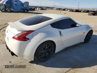 2014 Nissan 370Z Nismo with VIN JN1AZ4EH0EM635111, listed as a Copart auction lot 87292134 with 185,356 mi miles and Salvage Title. Bid and sale history available at DreamBid. Image 3.