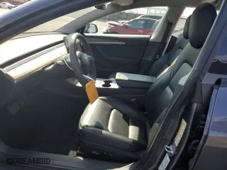 2022 Tesla Model 3 with VIN 5YJ3E1EA1NF372879, listed as a Copart auction lot 71604604 with 60,925 mi miles and Salvage Title. Bid and sale history available at carsss.com. Image 7.