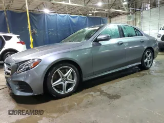 2018 Mercedes-Benz E 300 z VIN WDDZF4KB8JA313472, wystawiony jako Copart lot #53959155 z przebiegiem Nie podano mil oraz Tytuł czysty. Historia ofert i sprzedaży dostępna na DreamBid. Obrazek 1.