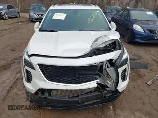 2019 Cadillac XT4 AWD Sport with VIN 1GYFZFR44KF146971, listed as a IAAI auction lot 41663031 with 129,248 mi miles and . Bid and sale history available at DreamBid. Image 6.