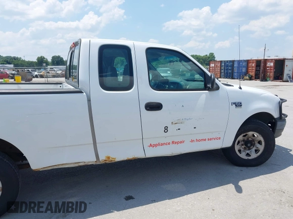 2003 Ford F-150 z VIN 2FTPX17L33CA59802, wystawiony jako IAAI lot #42669475 z przebiegiem 210 015 mil mil oraz . Historia ofert i sprzedaży dostępna na DreamBid. Obrazek 13.