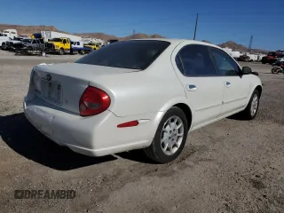 2001 Nissan Maxima GXE z VIN JN1CA31D61T818364, wystawiony jako Copart lot #67593624 z przebiegiem 158 601 mil mil oraz Szkoda całkowita • Salvage title. Historia ofert i sprzedaży dostępna na DreamBid. Obrazek 3.