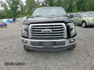 2015 Ford F-150 XL with VIN 1FTEW1CF2FFB08636, listed as a Copart auction lot 59760685 with 123,592 mi miles and Salvage title. Bid and sale history available at DreamBid. Image 14.