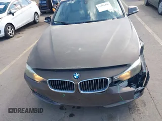2014 BMW 3 Series 320i xDrive with VIN WBA3C3C58EF983816, listed as a IAAI auction lot 41949430 with 111,627 mi miles. Bid and sale history available at carsss.com. Image 12.