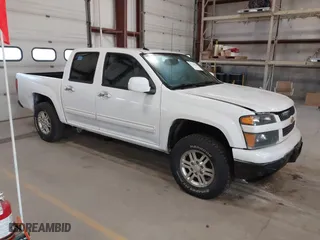 2012 Chevrolet Colorado LT w/1LT with VIN 1GCHTCFEXC8128458, listed as a IAAI auction lot 41758826 with 267,202 mi miles. Bid and sale history available at carsss.com. Image 1.