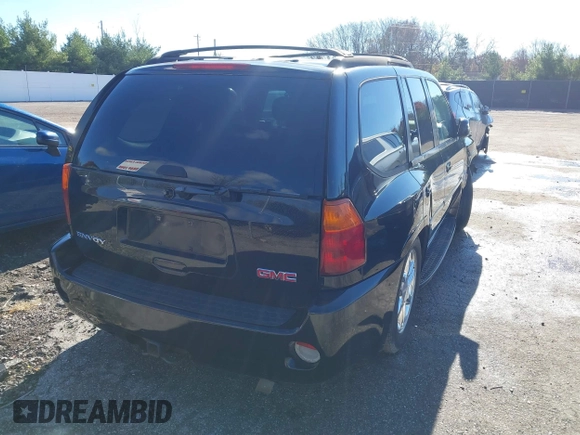 2006 GMC Envoy Denali with VIN 1GKET63M462257064, listed as a IAAI auction lot 40793921 with 179,304 mi miles. Bid and sale history available at carsss.com. Image 4.
