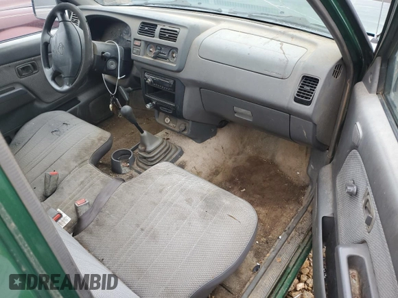 1998 Nissan Frontier XE with VIN 1N6DD21S8WC303274, listed as a Copart auction lot 79755584 with Not provided miles and Salvage title. Bid and sale history available at DreamBid. Image 8.