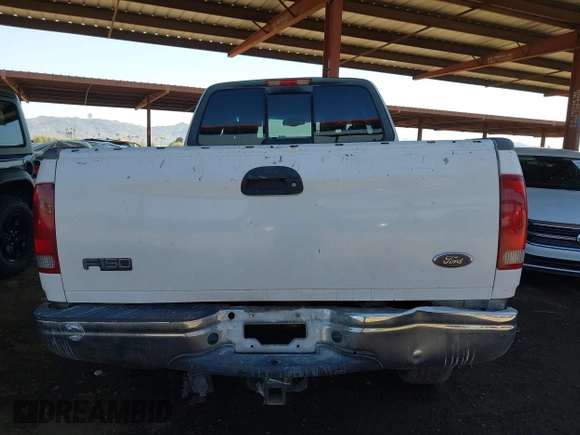 2003 Ford F-150 XL with VIN 1FTRX18L03NA45728, listed as a IAAI auction lot 41860421 with 179,596 mi miles. Bid and sale history available at carsss.com. Image 16.