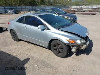 2007 Honda Civic Cpe EX with VIN 2HGFG128X7H547623, listed as a IAAI auction lot 42033010 with 228,518 mi miles. Bid and sale history available at carsss.com. Image 1.