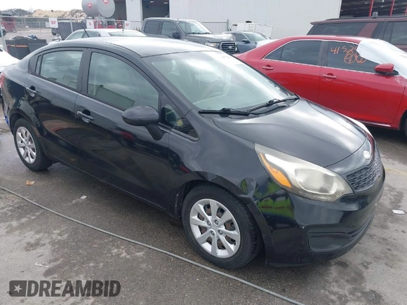 2015 Kia Rio LX with VIN KNADM4A39F6440291, listed as a IAAI auction lot 41532881 with 97,238 mi miles. Bid and sale history available at carsss.com. Image 1.