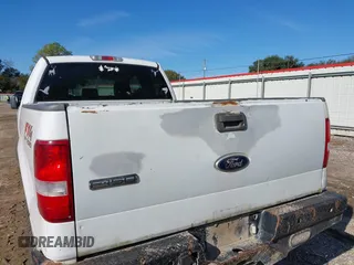 2006 Ford F-150 STX with VIN 1FTRX14W56NB45439, listed as a IAAI auction lot 41020833 with 401,176 mi miles. Bid and sale history available at carsss.com. Image 6.
