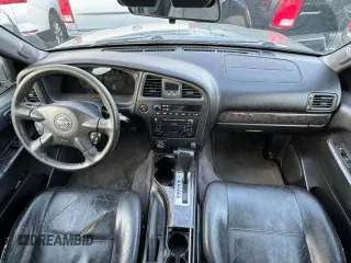 2004 Nissan Pathfinder SE with VIN JN8DR09Y64W905091, listed as a Copart auction lot 57692615 with 238,457 mi miles and Clean title. Bid and sale history available at DreamBid. Image 9.