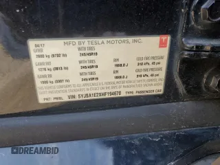 2017 Tesla Model S 100D with VIN 5YJSA1E2XHF194670, listed as a Copart auction lot 57919145 with 122,314 mi miles and Clean title. Bid and sale history available at DreamBid. Image 13.
