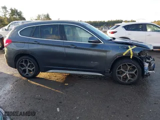 2016 BMW X1 xDrive28i with VIN WBXHT3C30GP881837, listed as a IAAI auction lot 41117389 with 84,157 mi miles. Bid and sale history available at carsss.com. Image 14.