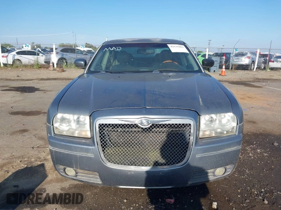 2006 Chrysler 300 Touring with VIN 2C3LA53G66H170047, listed as a IAAI auction lot 42135663 with 215,285 mi miles. Bid and sale history available at carsss.com. Image 6.