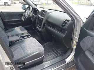 2002 Honda CR-V LX z VIN JHLRD78552C080484, wystawiony jako IAAI lot #42471119 z przebiegiem 256 937 mil mil oraz . Historia ofert i sprzedaży dostępna na DreamBid. Obrazek 5.