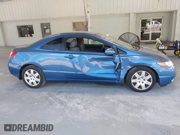 2008 Honda Civic Cpe LX with VIN 2HGFG12698H573436, listed as a IAAI auction lot 41970955 with 142,166 mi miles. Bid and sale history available at carsss.com. Image 13.