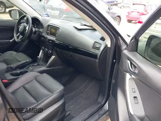 2014 Mazda CX-5 Grand Touring with VIN JM3KE2DY0E0354220, listed as a IAAI auction lot 41885502 with 168,901 mi miles. Bid and sale history available at carsss.com. Image 5.
