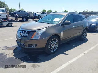 2015 Cadillac SRX Performance Collection with VIN 3GYFNFE35FS569682, listed as a IAAI auction lot 42322229 with 124,365 mi miles and . Bid and sale history available at DreamBid. Image 17.
