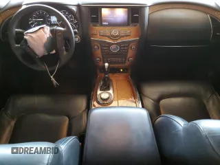 2012 Infiniti QX56 7-passenger with VIN JN8AZ2NE1C9020532, listed as a Copart auction lot 68012654 with 141,470 mi miles and Salvage Title. Bid and sale history available at carsss.com. Image 8.
