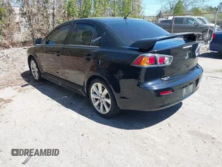 2012 Mitsubishi Lancer GT with VIN JA32U8FW6CU021485, listed as a IAAI auction lot 42159256 with 138,455 mi miles. Bid and sale history available at carsss.com. Image 3.