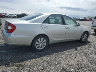 2004 Toyota Camry LE with VIN 4T1BF30K84U588220, listed as a Copart auction lot 54441185 with 165,890 mi miles and Non Repairable. Bid and sale history available at carsss.com. Image 3.