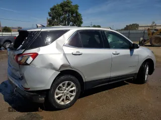 2018 Chevrolet Equinox LT z VIN 3GNAXSEV2JS568428, wystawiony jako Copart lot #60731665 z przebiegiem 47 710 mil mil oraz Czysty tytuł • Clean title. Historia ofert i sprzedaży dostępna na DreamBid. Obrazek 3.