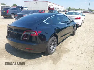 2018 Tesla Model 3 Long Range Battery with VIN 5YJ3E1EB1JF122786, listed as a IAAI auction lot 42010451 with 85,510 mi miles and . Bid and sale history available at DreamBid. Image 4.