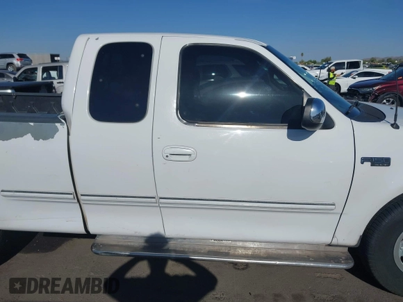 1998 Ford F-150 with VIN 1FTZX1720WKB74924, listed as a IAAI auction lot 42046778 with 240,725 mi miles and . Bid and sale history available at DreamBid. Image 13.