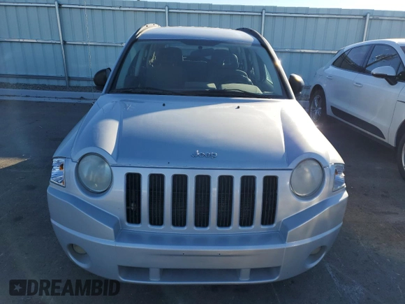 2007 Jeep Compass Sport with VIN 1J8FT47W67D414284, listed as a Copart auction lot 47212335 with 172,769 mi miles and Clean Title. Bid and sale history available at carsss.com. Image 5.