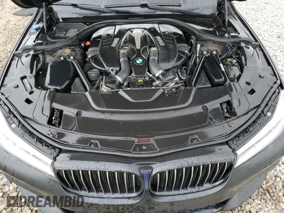 2018 BMW 7 Series 750i with VIN WBA7F0C55JGM23537, listed as a Copart auction lot 76824074 with 64,682 mi miles and Salvage Title. Bid and sale history available at carsss.com. Image 11.