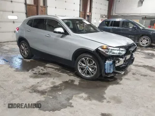 2020 BMW X2 xDrive28i with VIN WBXYJ1C09L5P35894, listed as a IAAI auction lot 41588426 with 24,476 mi miles. Bid and sale history available at carsss.com. Image 1.