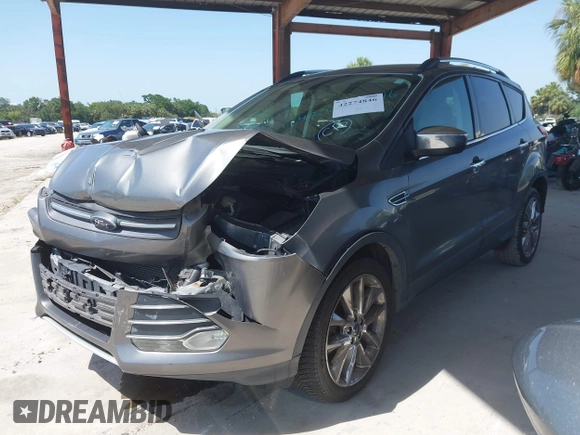 2014 Ford Escape SE z VIN 1FMCU0G97EUE34174, wystawiony jako IAAI lot #42274846 z przebiegiem 121 801 mil mil oraz . Historia ofert i sprzedaży dostępna na DreamBid. Obrazek 2.