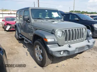 2018 Jeep Wrangler Unlimited Sport S with VIN 1C4HJXDG5JW298947, listed as a IAAI auction lot 42425901 with 101,596 mi miles and . Bid and sale history available at DreamBid. Image 1.