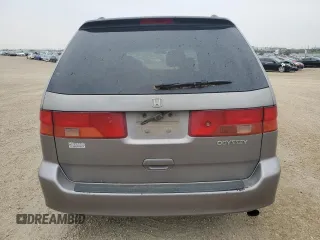 2000 Honda Odyssey EX z VIN 2HKRL186XYH010384, wystawiony jako Copart lot #60871845 z przebiegiem 423 167 mil mil oraz Czysty tytuł • Clean title. Historia ofert i sprzedaży dostępna na DreamBid. Obrazek 6.