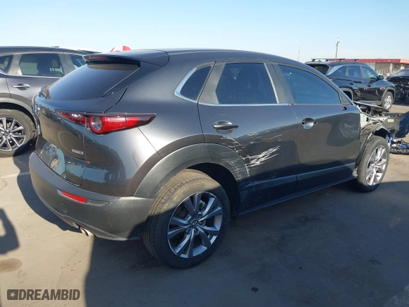 2021 Mazda CX-30 Select with VIN 3MVDMBBL5MM318545, listed as a IAAI auction lot 42011788 with 46,935 mi miles. Bid and sale history available at carsss.com. Image 4.