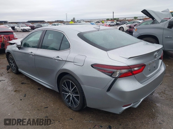 2022 Toyota Camry SE with VIN 4T1G11AKXNU697576, listed as a IAAI auction lot 41947082 with 67,199 mi miles and . Bid and sale history available at DreamBid. Image 3.