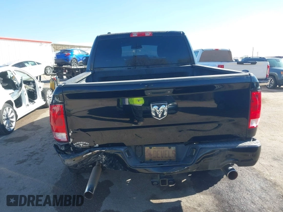 2015 Ram 1500 Express z VIN 1C6RR6KT1FS517948, wystawiony jako IAAI lot #41355978 z przebiegiem 94 784 mil mil oraz . Historia ofert i sprzedaży dostępna na DreamBid. Obrazek 16.