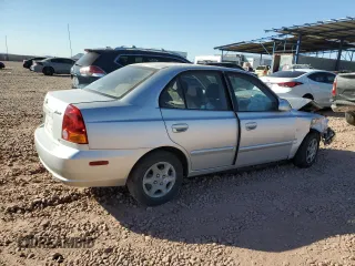 2003 Hyundai Accent GL with VIN KMHCG45CX3U429660, listed as a Copart auction lot 43824125 with 0 mi miles and Salvage Title. Bid and sale history available at carsss.com. Image 3.