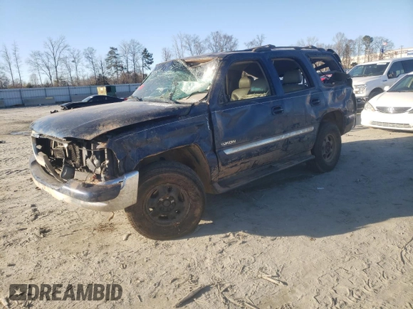 2002 GMC Yukon SLT with VIN 1GKEK13Z62J148557, listed as a Copart auction lot 43246075 with 242,968 mi miles and Salvage Title. Bid and sale history available at carsss.com. Image 1.
