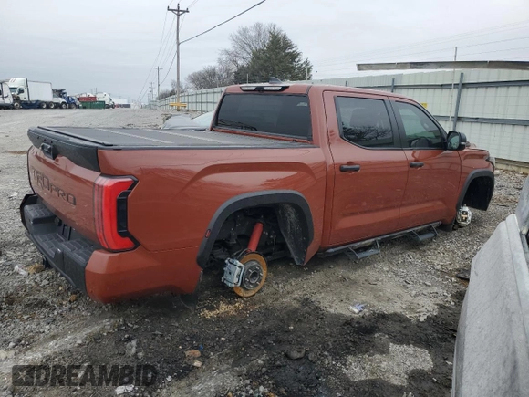 2024 Toyota Tundra TRD Pro Hybrid with VIN 5TFPC5DB6RX076616, listed as a Copart auction lot 43985855 with 7,273 mi miles and Salvage title. Bid and sale history available at DreamBid. Image 3.