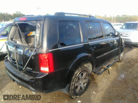 2012 Honda Pilot Touring with VIN 5FNYF3H90CB035309, listed as a IAAI auction lot 41063215 with 228,081 mi miles and . Bid and sale history available at carsss.com. Image 4.