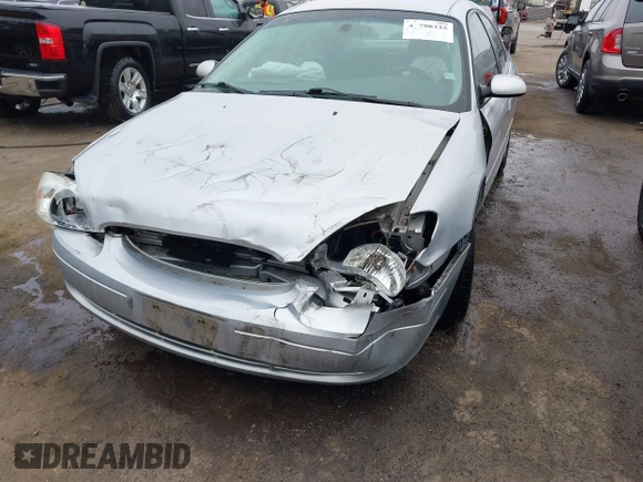 2003 Ford Taurus SE Standard with VIN 1FAFP53273G132268, listed as a IAAI auction lot 41790335 with 202,724 mi miles. Bid and sale history available at carsss.com. Image 6.