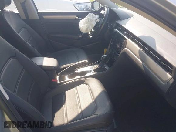 2021 Volkswagen Passat SE with VIN 1VWSA7A38MC012907, listed as a IAAI auction lot 42581889 with 76,001 mi miles and . Bid and sale history available at DreamBid. Image 5.