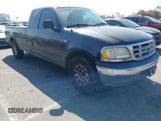1999 Ford F-150 with VIN 1FTZX1721XKA82769, listed as a IAAI auction lot 41966574 with 190,289 mi miles and . Bid and sale history available at DreamBid. Image 1.