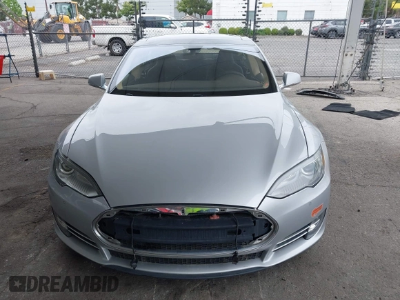 2014 Tesla Model S 60 with VIN 5YJSA1H12EFP32213, listed as a IAAI auction lot 42194085 with 56,071 mi miles and . Bid and sale history available at DreamBid. Image 13.