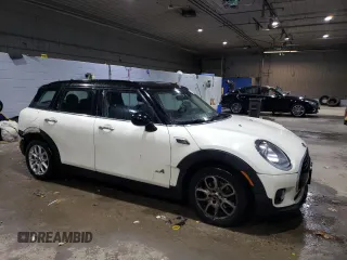 2017 MINI Clubman Cooper with VIN WMWLU1C57H2F27158, listed as a Copart auction lot 77672744 with 73,850 mi miles and Salvage Title. Bid and sale history available at carsss.com. Image 4.