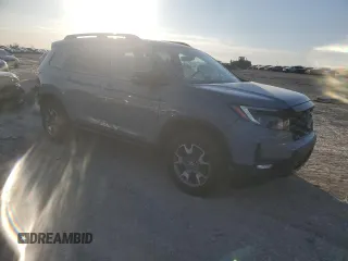 2022 Honda Passport TrailSport z VIN 5FNYF8H62NB019960, wystawiony jako Copart lot #89399245 z przebiegiem 29 813 mil mil oraz Szkoda całkowita • Salvage title. Historia ofert i sprzedaży dostępna na DreamBid. Obrazek 4.