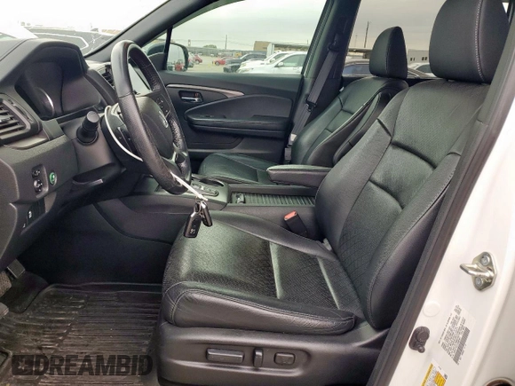 2020 Honda Passport EX-L with VIN 5FNYF7H57LB002957, listed as a Copart auction lot 51022825 with 74,868 mi miles and Salvage Title. Bid and sale history available at DreamBid. Image 7.
