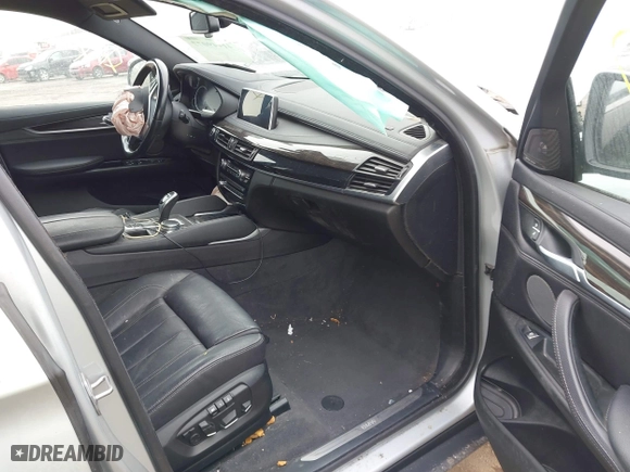 2018 BMW X6 xDrive35i with VIN 5UXKU2C50J0X49445, listed as a IAAI auction lot 41449077 with 130,912 mi miles. Bid and sale history available at carsss.com. Image 5.